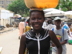 Aicha selling "Ice wata"